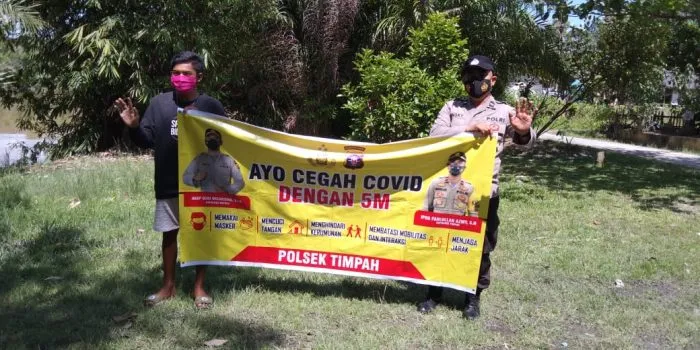 Mencegah Kasus Covid-19 di Timpah, Personel Polsek Timpah Sosialisasikan Prokes 1 Mencegah Kasus Covid-19 di Timpah, Personel Polsek Timpah Sosialisasikan Prokes 1